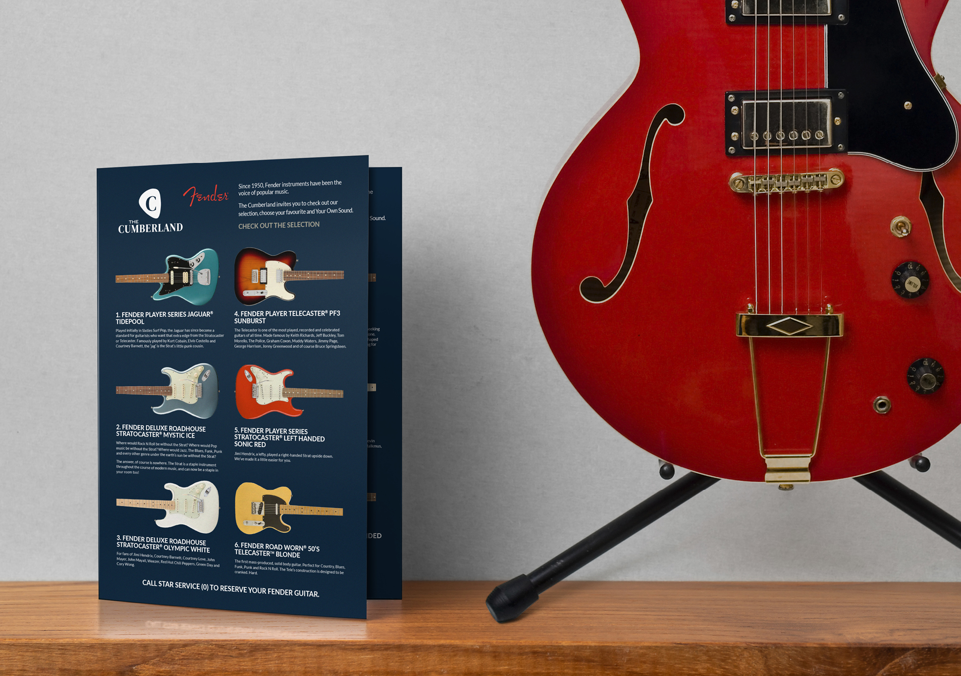 Cumberland guitar menu next to a guitar