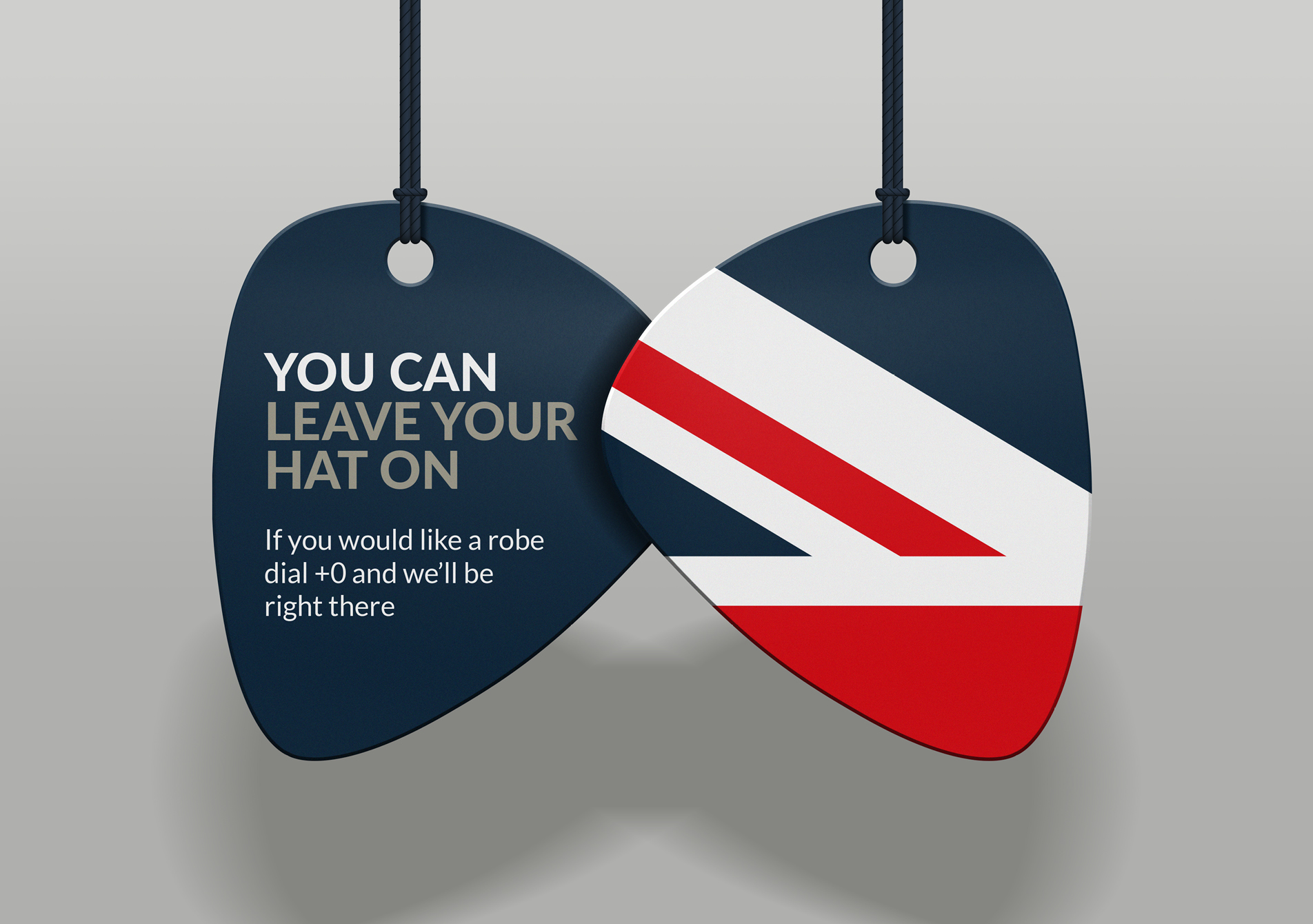 Cumberland hanging signage based on the plectrum-shaped logo