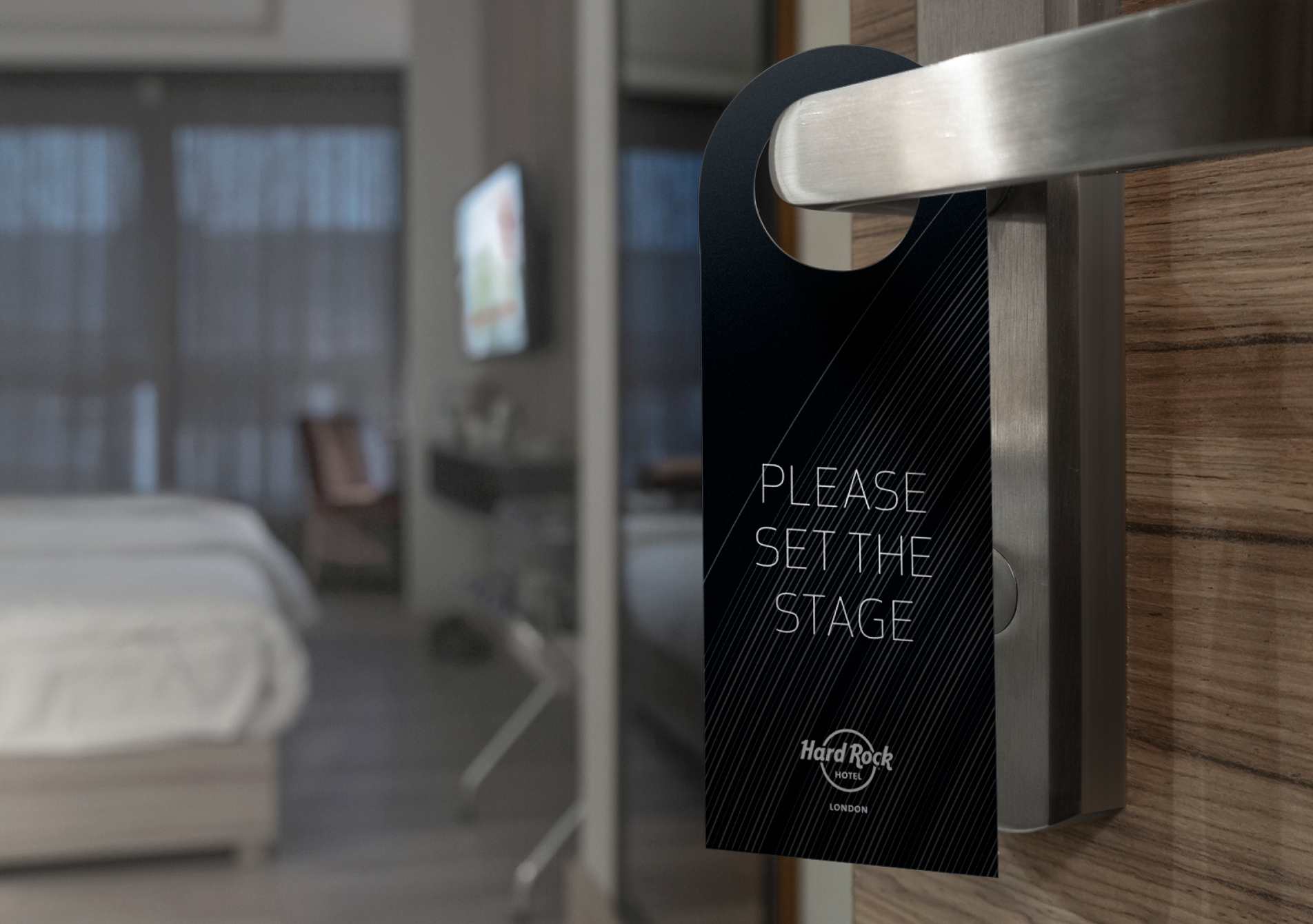 Hard Rock Hotel London do not disturb door hanger print design on hotel room door handle