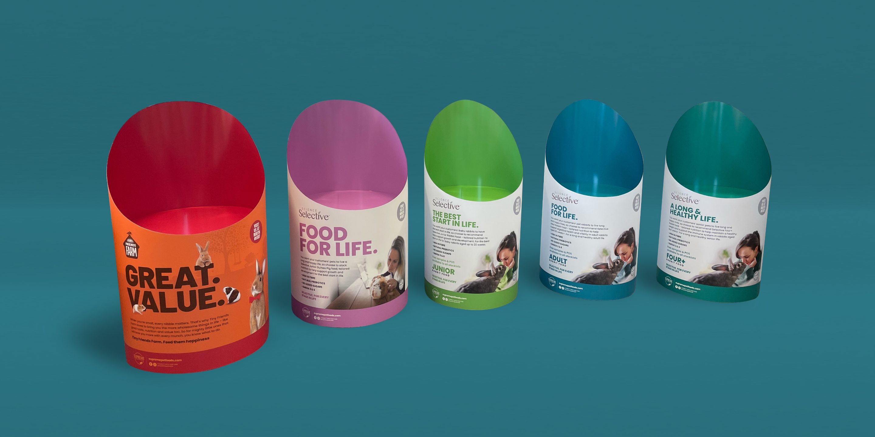 Supreme Petfoods display units on a green background