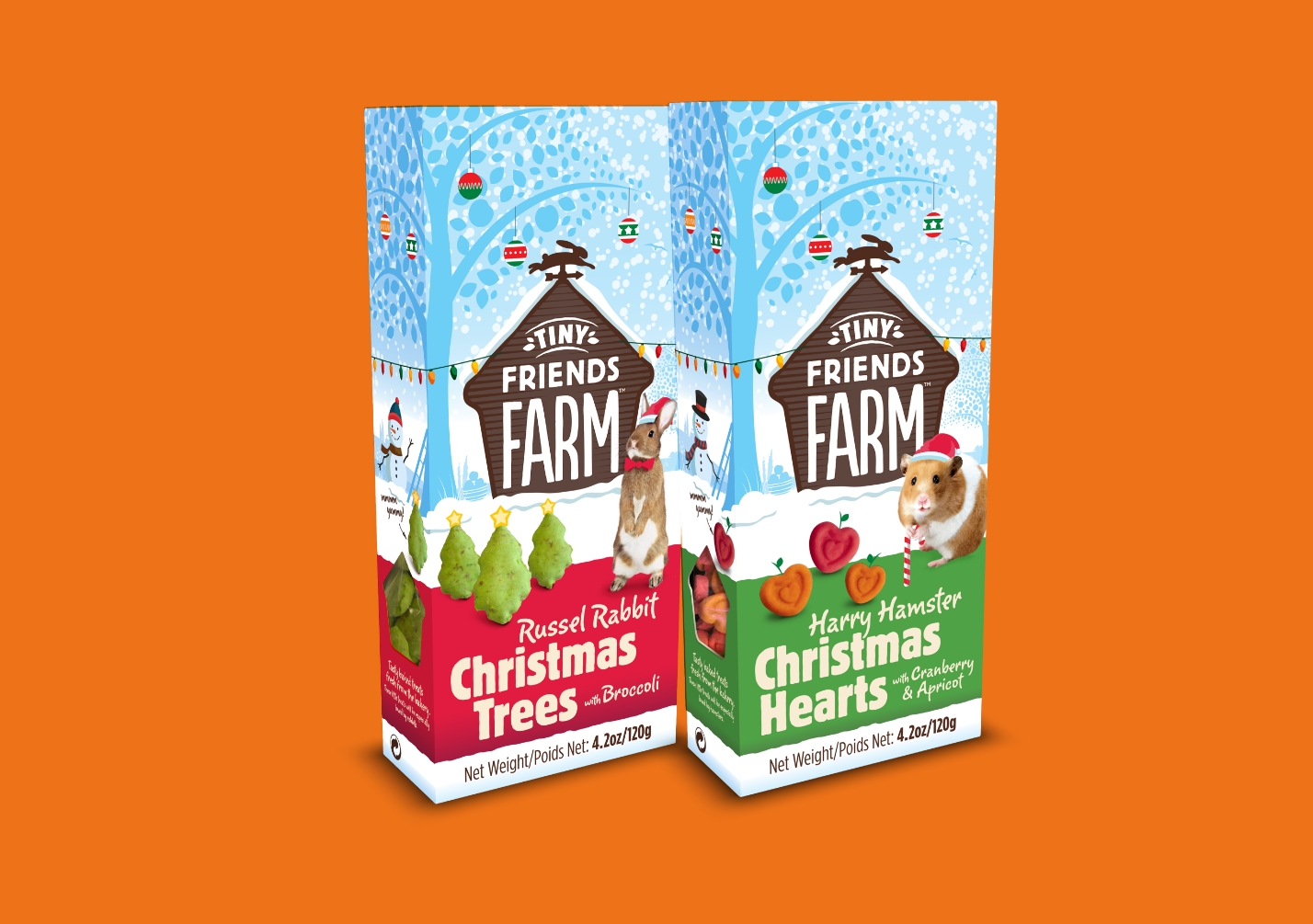 Two boxes of Tiny Friends Farm treats on an orange background